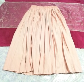 粉色百褶膝盖长半身裙