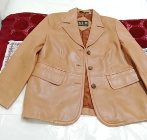Оранжево-коричневое пальто из овечьей кожи daks london made in korea