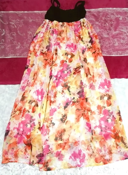 Gilet noir jupe longue caraco en mousseline de soie à fleurs orange une pièce
